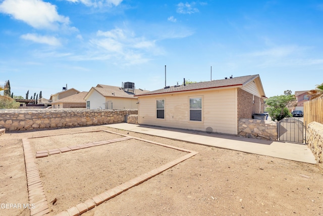 2352 Tierra Blanda Dr, El Paso, TX 79938 - rear view of property featuring a gate, central AC, a fenced backyard, and a patio