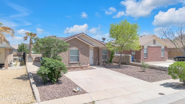 2352 Tierra Blanda Dr, El Paso, TX 79938 - ranch-style house featuring fence and brick siding