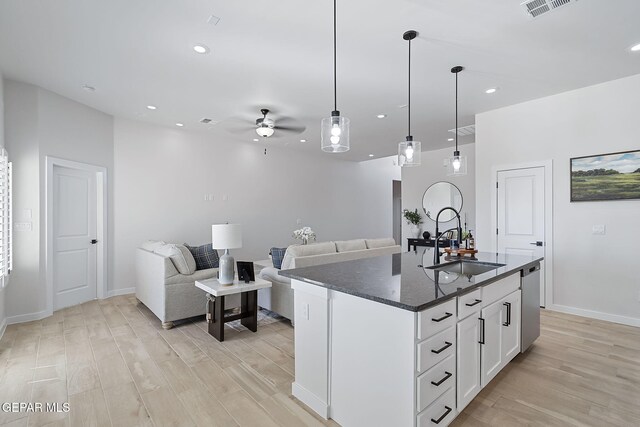 15380 Imagine Dr, El Paso, TX 79938 - kitchen with a sink, dishwasher, ceiling fan, light wood-style flooring, and visible vents