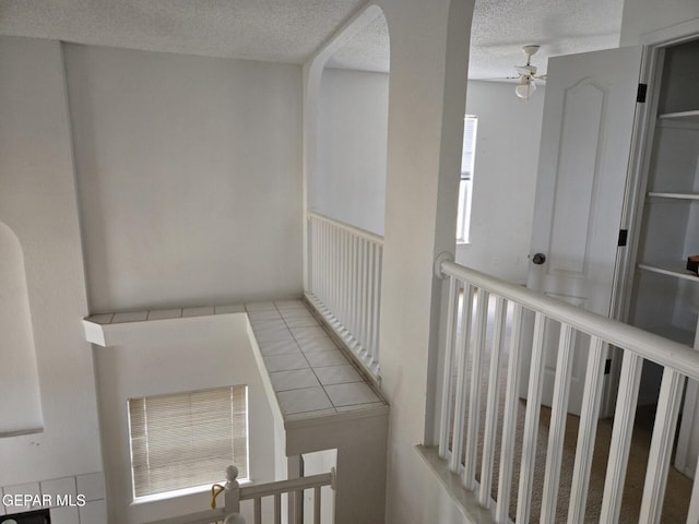12525 Angie Bombach, El Paso, TX 79936 - hall featuring a textured ceiling