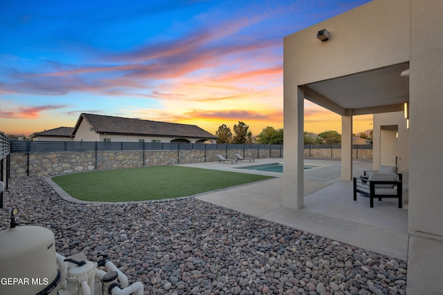 view of yard with a patio, a fenced backyard, and a fenced in pool