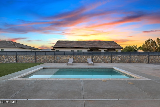 view of pool featuring a fenced in pool, fence, and a patio