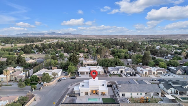 drone / aerial view featuring a mountain view and a residential view