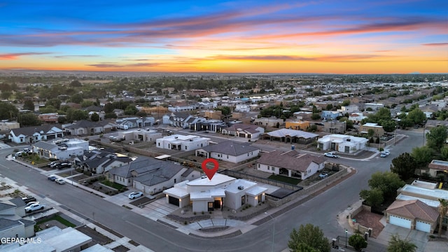 birds eye view of property with a residential view
