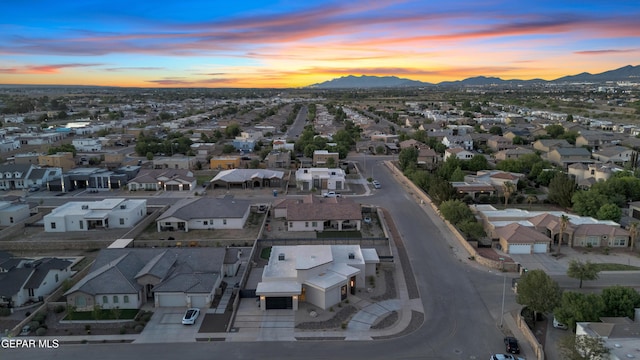 bird's eye view with a mountain view and a residential view
