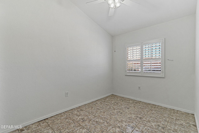 unfurnished room with baseboards, ceiling fan, light tile patterned flooring, and vaulted ceiling