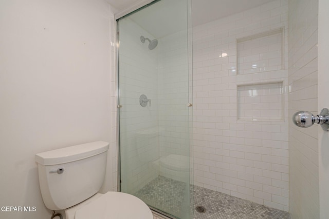 1800 N Stanton Unit 502, El Paso, TX 79902 - full bathroom featuring a shower stall and toilet