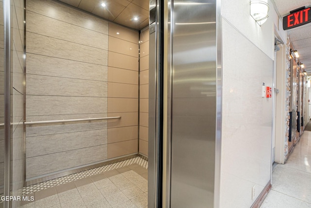 1800 N Stanton Unit 502, El Paso, TX 79902 - interior space featuring recessed lighting, elevator, and tile patterned flooring