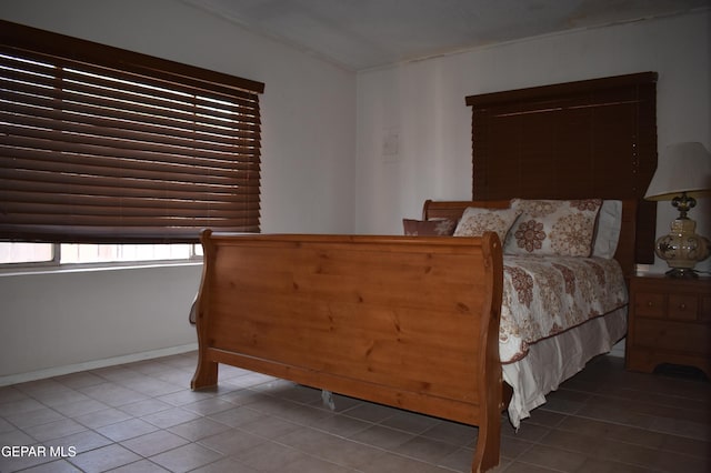 632 Mauer Rd, El Paso, TX 79915 - bedroom featuring tile patterned flooring and baseboards