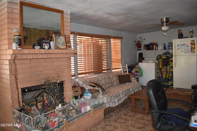 632 Mauer Rd, El Paso, TX 79915 - living area featuring ceiling fan and a fireplace