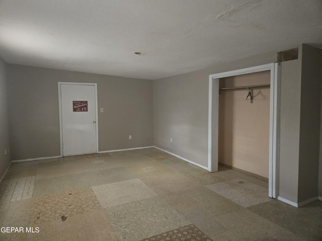 632 Mauer Rd, El Paso, TX 79915 - unfurnished bedroom featuring tile patterned floors and a closet