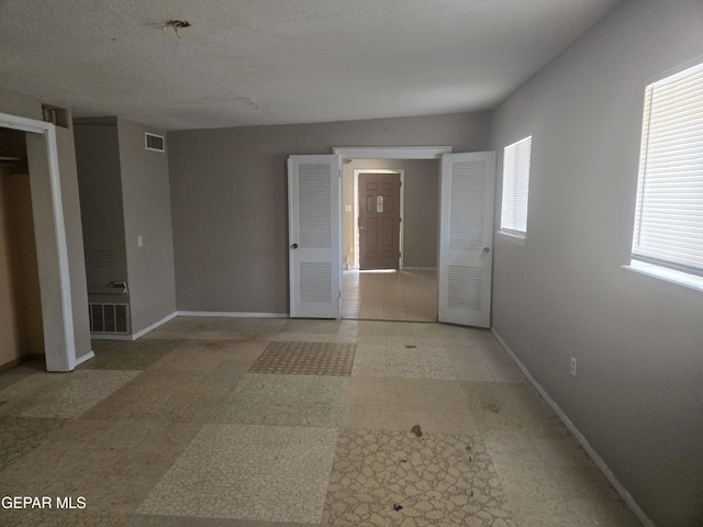 632 Mauer Rd, El Paso, TX 79915 - unfurnished bedroom with baseboards