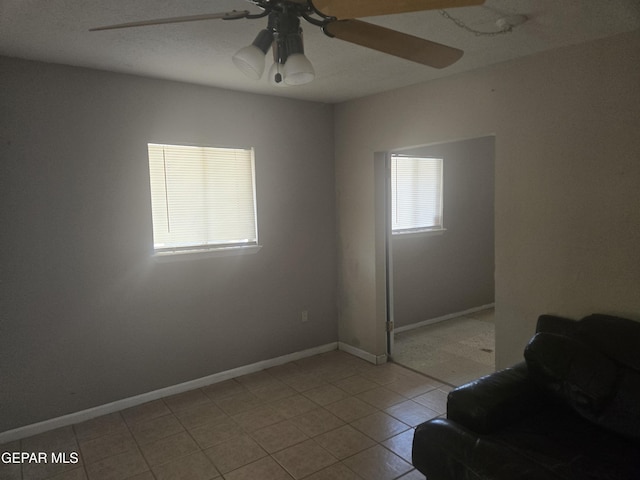 632 Mauer Rd, El Paso, TX 79915 - living area with a ceiling fan and light tile patterned floors