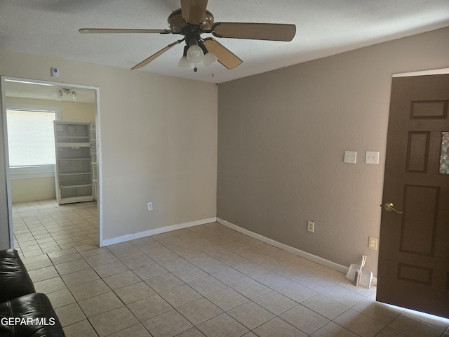 632 Mauer Rd, El Paso, TX 79915 - spare room featuring light tile patterned floors and ceiling fan