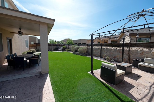 14700 Alton Oaks, El Paso, TX 79938 - view of yard with a residential view, ceiling fan, a fenced backyard, outdoor dining area, and a patio