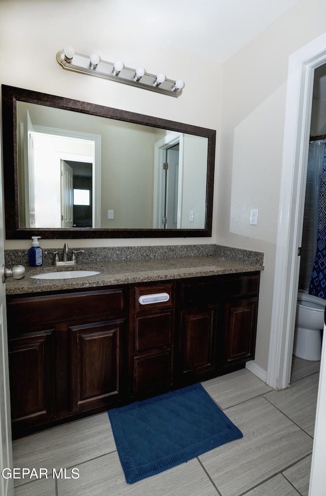 14700 Alton Oaks, El Paso, TX 79938 - full bathroom featuring vanity, wood finished floors, and toilet