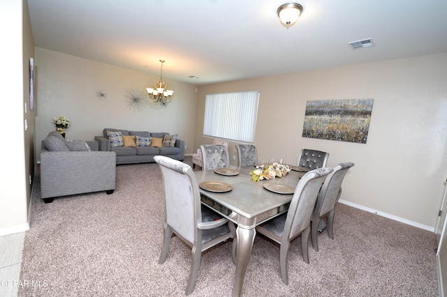 14700 Alton Oaks, El Paso, TX 79938 - carpeted dining space with baseboards, a notable chandelier, and visible vents