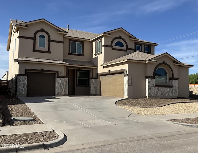 14700 Alton Oaks, El Paso, TX 79938 - view of front facade featuring stucco siding, driveway, a shingled roof, and a garage