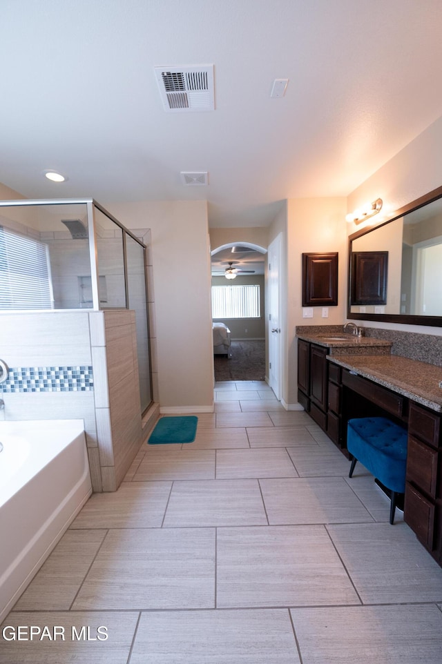 14700 Alton Oaks, El Paso, TX 79938 - bathroom featuring visible vents, tile patterned flooring, a stall shower, and vanity