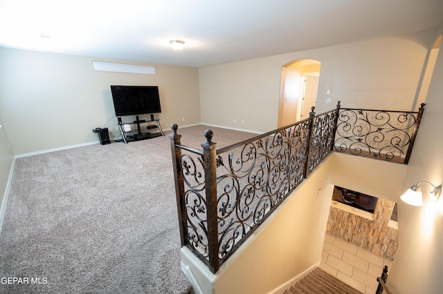 14700 Alton Oaks, El Paso, TX 79938 - staircase featuring carpet floors, arched walkways, and baseboards