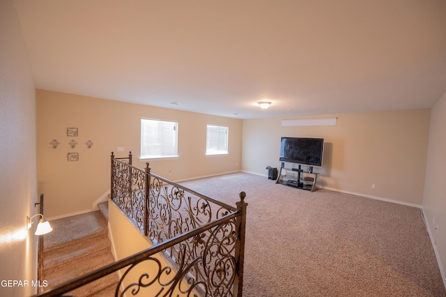 14700 Alton Oaks, El Paso, TX 79938 - living area with baseboards, stairs, and carpet