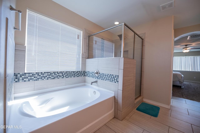 14700 Alton Oaks, El Paso, TX 79938 - bathroom with a stall shower, a garden tub, ensuite bathroom, and visible vents