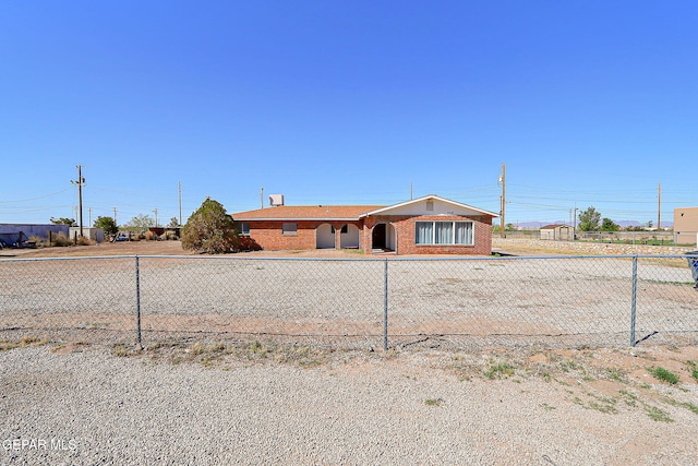 9668 Kathy Ave, El Paso, TX 79927 - view of front of house featuring brick siding and fence private yard