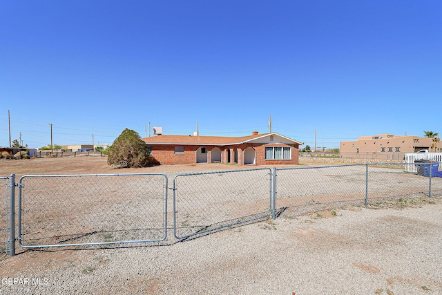 9668 Kathy Ave, El Paso, TX 79927 - single story home with fence private yard, brick siding, and a gate