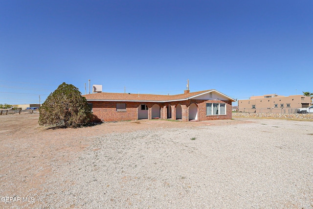 9668 Kathy Ave, El Paso, TX 79927 - back of house with brick siding and fence