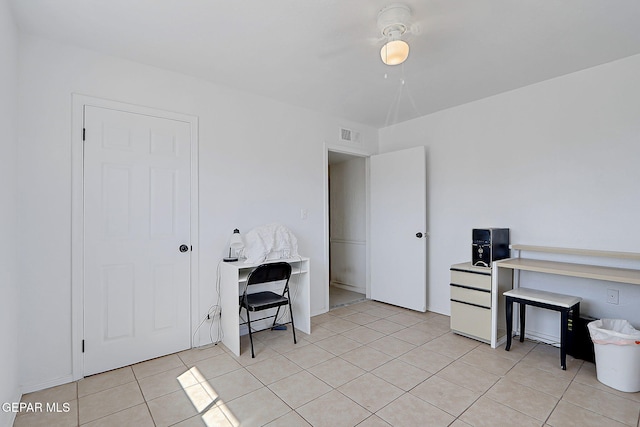 9668 Kathy Ave, El Paso, TX 79927 - office featuring light tile patterned flooring, visible vents, and a ceiling fan