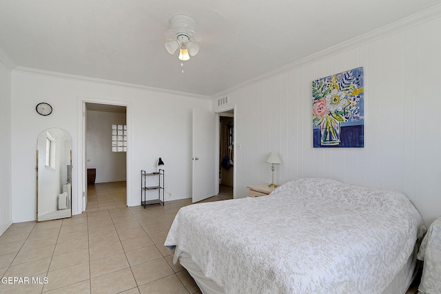9668 Kathy Ave, El Paso, TX 79927 - bedroom featuring light tile patterned floors, visible vents, and ornamental molding