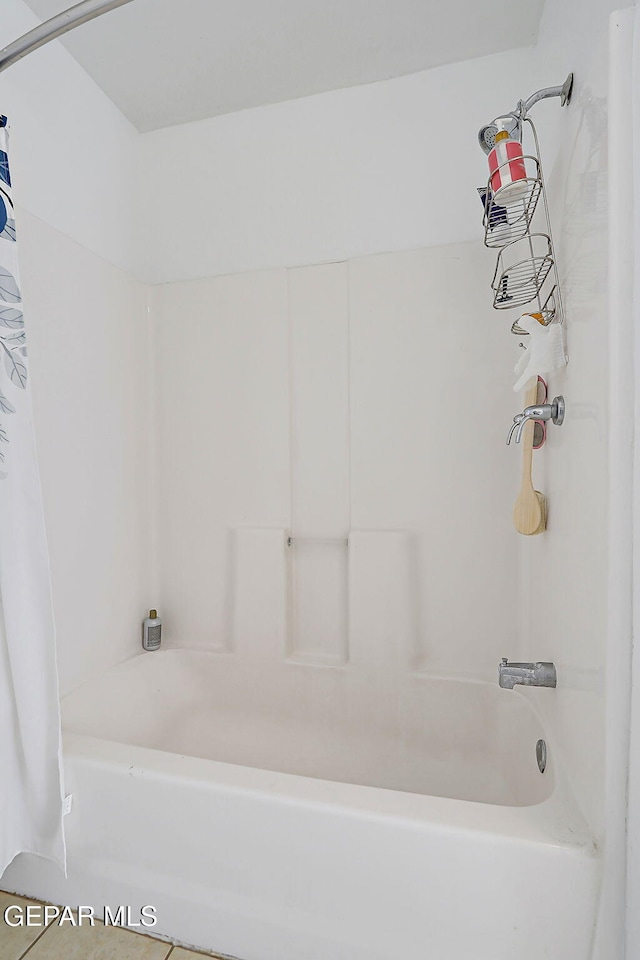9668 Kathy Ave, El Paso, TX 79927 - full bathroom featuring shower / tub combo with curtain