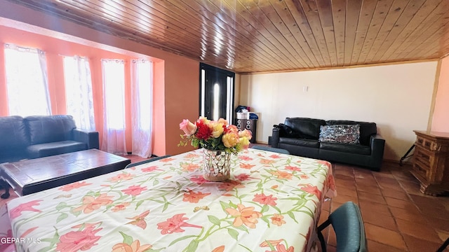 610 Jewels Dr, Socorro, TX 79927 - tiled dining room featuring crown molding and wood ceiling