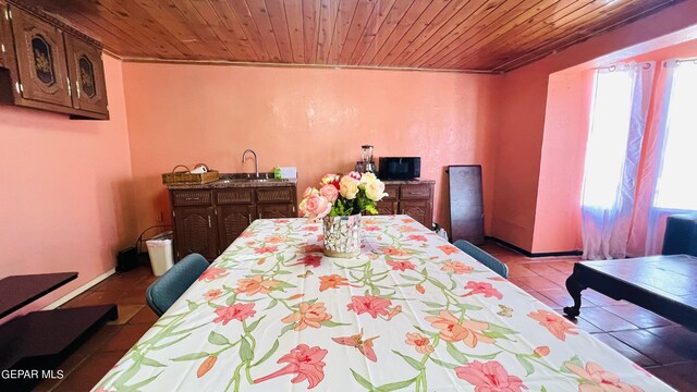 610 Jewels Dr, Socorro, TX 79927 - dining room featuring tile patterned flooring and wood ceiling