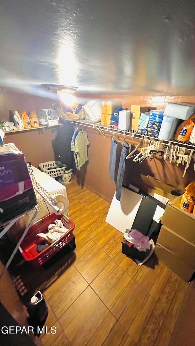 610 Jewels Dr, Socorro, TX 79927 - walk in closet with wood finished floors