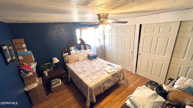610 Jewels Dr, Socorro, TX 79927 - bedroom with hardwood / wood-style flooring, a textured ceiling, and a ceiling fan