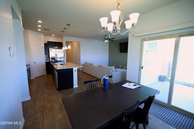 1628 Sam Dominguez, El Paso, TX 79928 - dining space with recessed lighting, visible vents, dark wood-style floors, and ceiling fan with notable chandelier