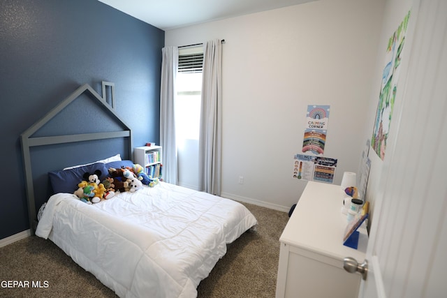 1628 Sam Dominguez, El Paso, TX 79928 - bedroom featuring baseboards and dark colored carpet