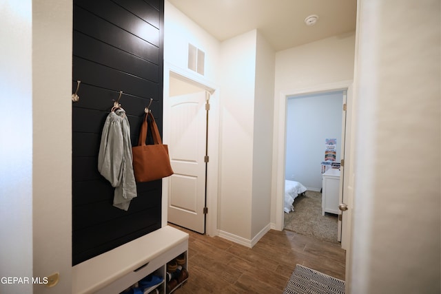 1628 Sam Dominguez, El Paso, TX 79928 - mudroom featuring wood finished floors, visible vents, and baseboards