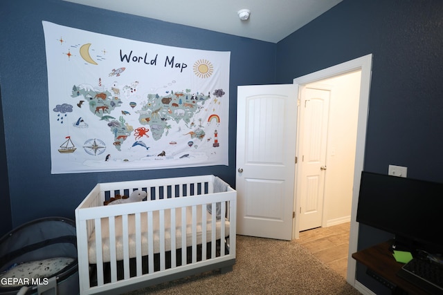 1628 Sam Dominguez, El Paso, TX 79928 - carpeted bedroom with a crib