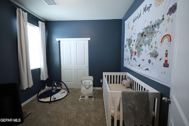 1628 Sam Dominguez, El Paso, TX 79928 - carpeted bedroom with visible vents, baseboards, a closet, and a nursery area