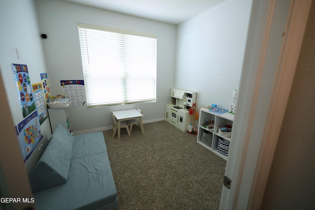 1628 Sam Dominguez, El Paso, TX 79928 - recreation room featuring baseboards and carpet floors