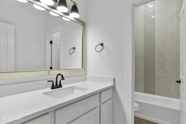 3780 Surmise St, El Paso, TX 79938 - full bath featuring vanity, toilet, shower / bath combination, and wood finished floors