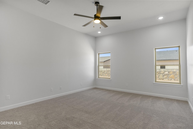 3749 Focus Pl, El Paso, TX 79938 - spare room featuring plenty of natural light, ceiling fan, baseboards, carpet, and recessed lighting