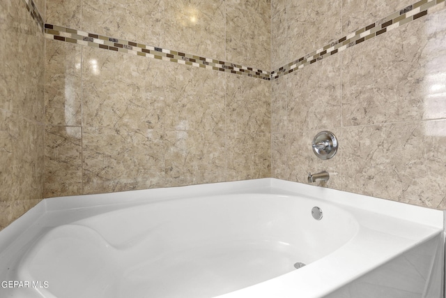 bathroom with a bath