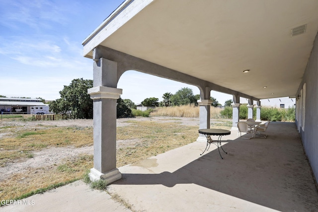 view of patio with visible vents