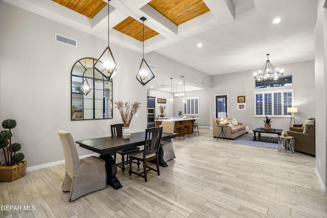 dining room with visible vents, baseboards, recessed lighting, light wood-style flooring, and a notable chandelier