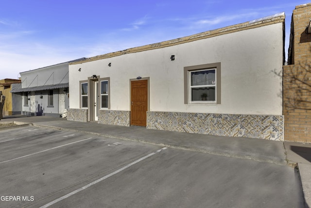 exterior space with uncovered parking