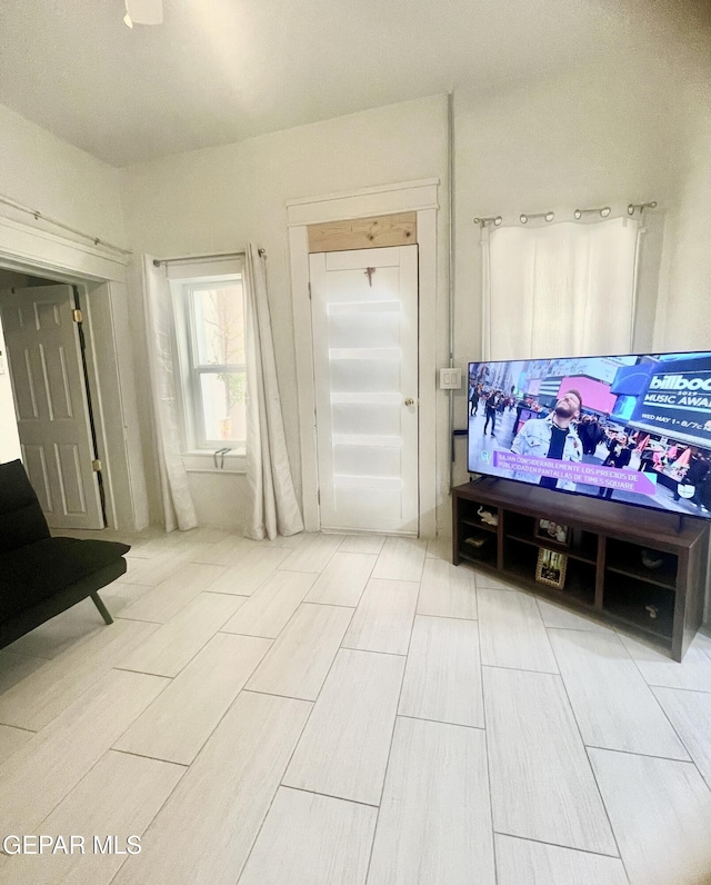 living area with light wood-style flooring
