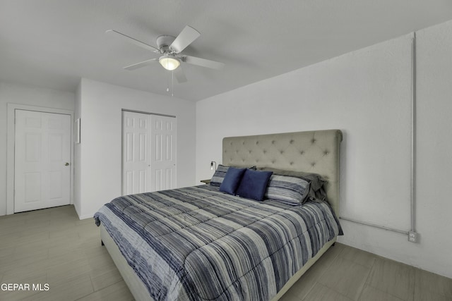 bedroom with a closet and ceiling fan